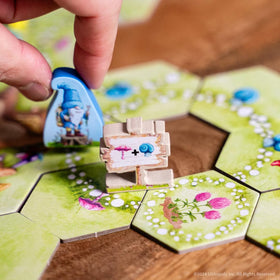 USAOPOLY Gnome Hollow player board features automatic scoring for easy tracking.