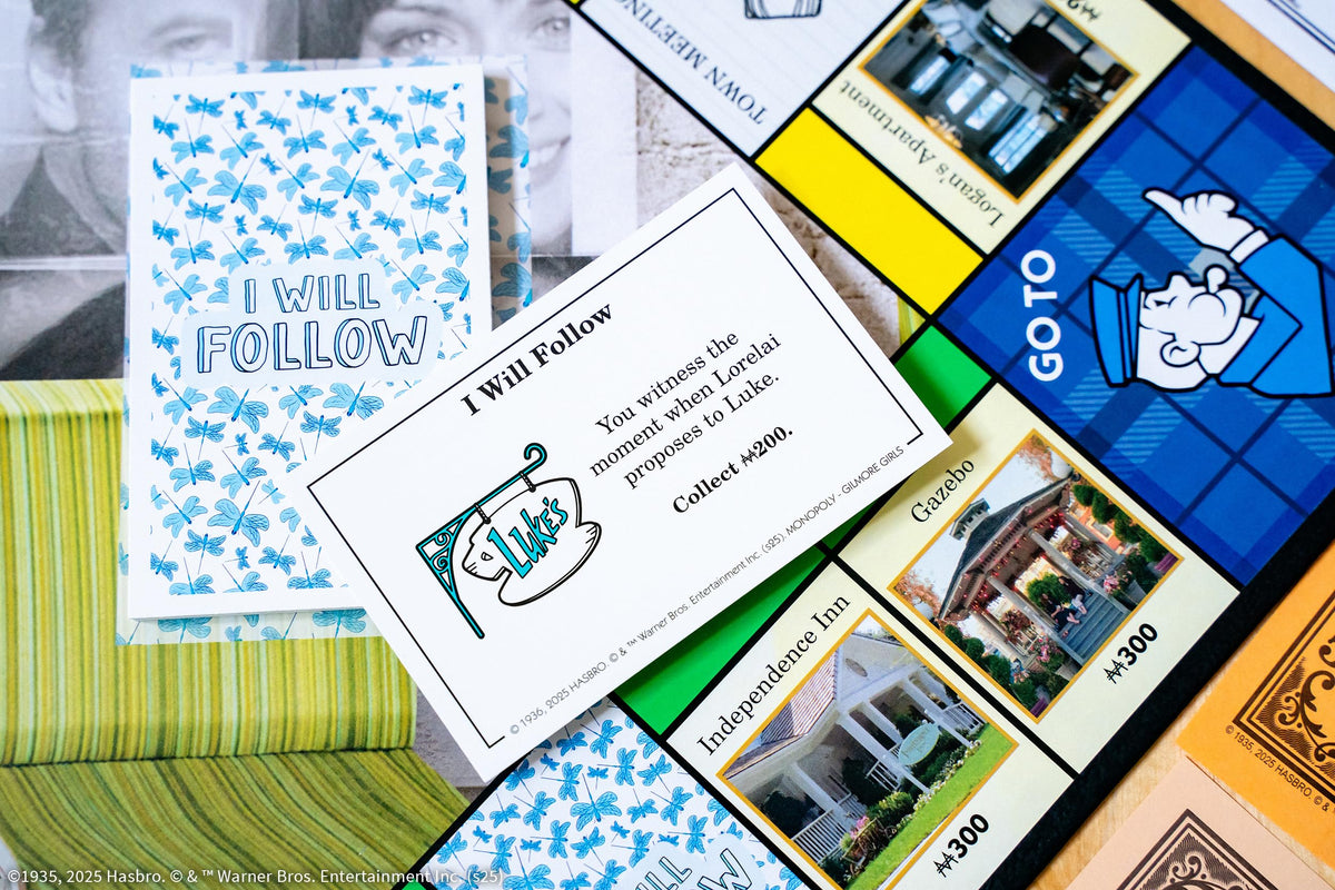 USAOPOLY Gilmore Girls Cup of Coffee token creates cozy moments around the board.