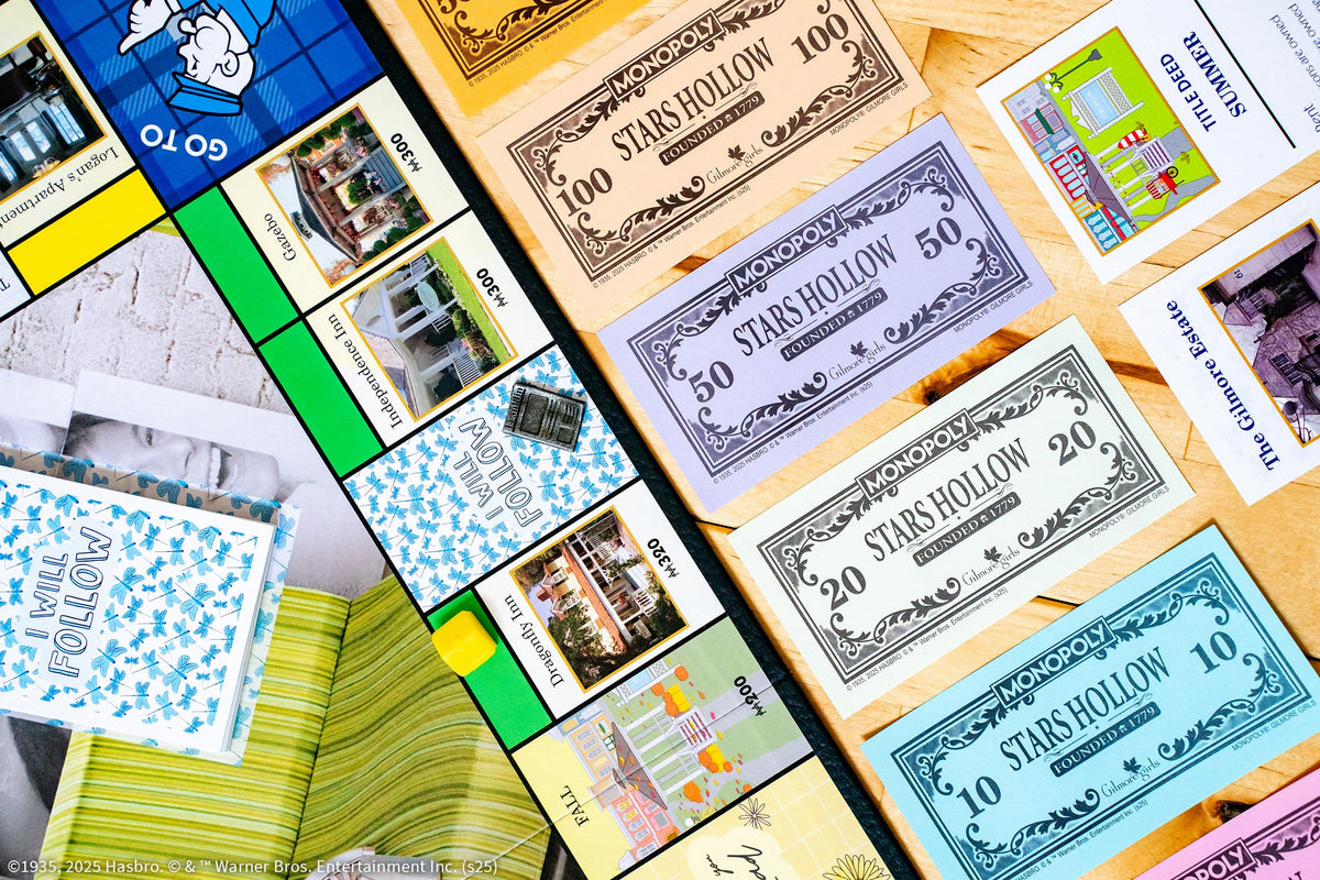 USAOPOLY Gilmore Girls School Newspaper token evokes Stars Hollow atmosphere during play.