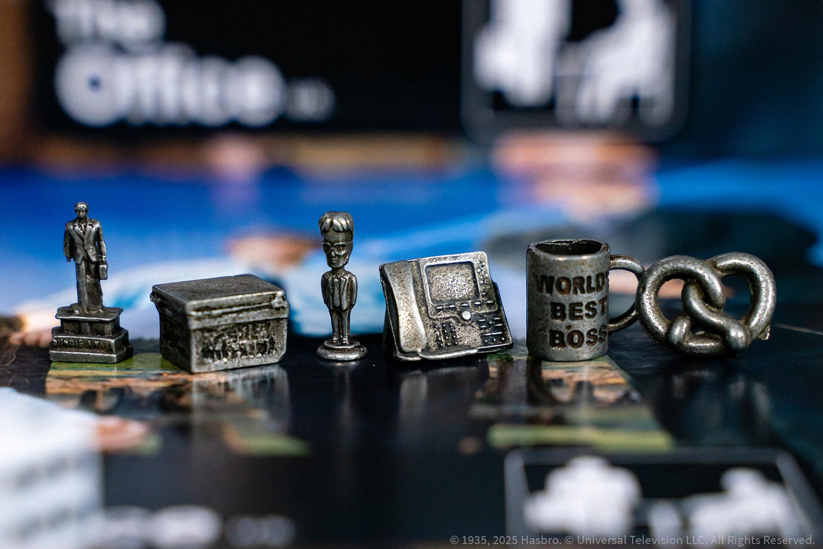 USAOPOLY Monopoly: The Office mug token highlights Michael's World's Best Boss for playful table moments.