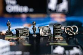 USAOPOLY Monopoly: The Office mug token highlights Michael's World's Best Boss for playful table moments.