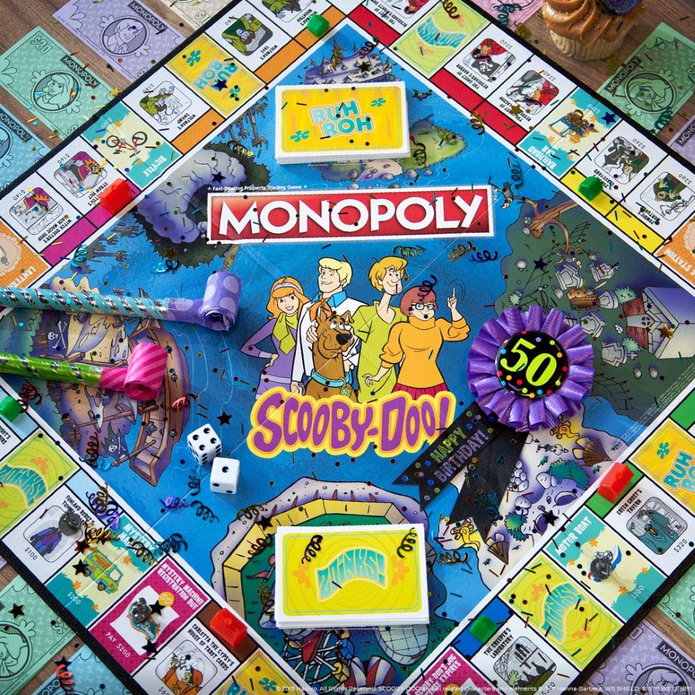 USAOPOLY Scooby-Doo location cards capture eerie spots for strategic trades.