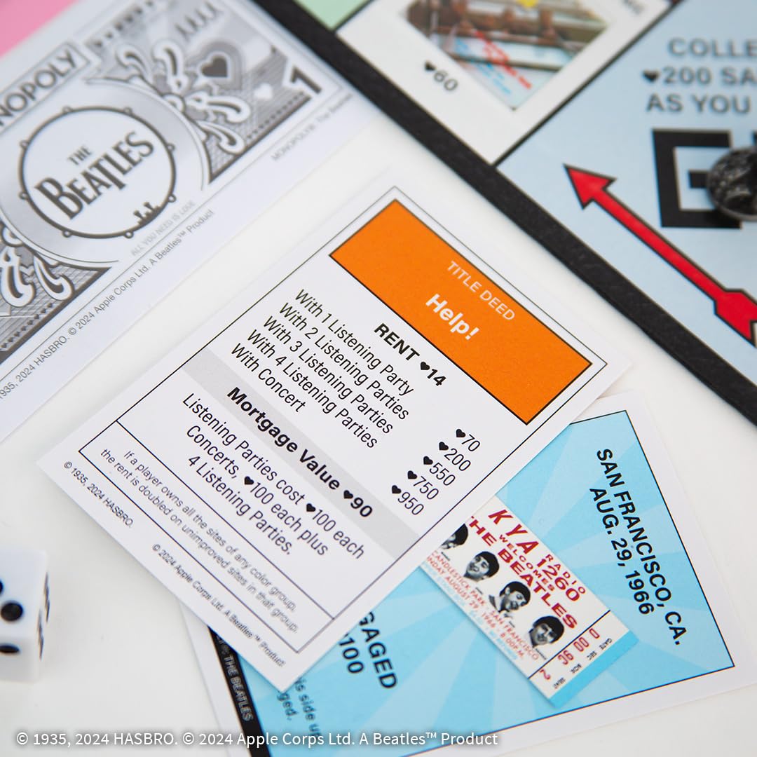 USAOPOLY custom money reflecting the Beatle era in play.