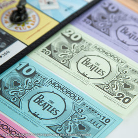 USAOPOLY Fab Four cards boost strategy with timeless Beatle twists.