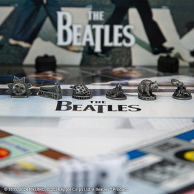 USAOPOLY Beatle title deed cards add nostalgic property trades.