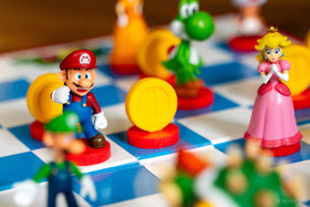 USAopoly Super Mario chess set Bowser piece in imposing form for epic battles