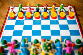 USAopoly Super Mario chess set chessboard-ready display setup