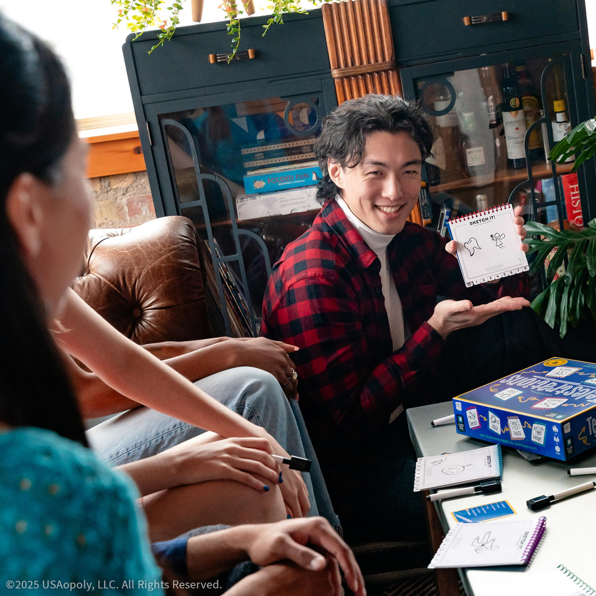 USAOPOLY Telestrations scorepad supports group play and friendly competition