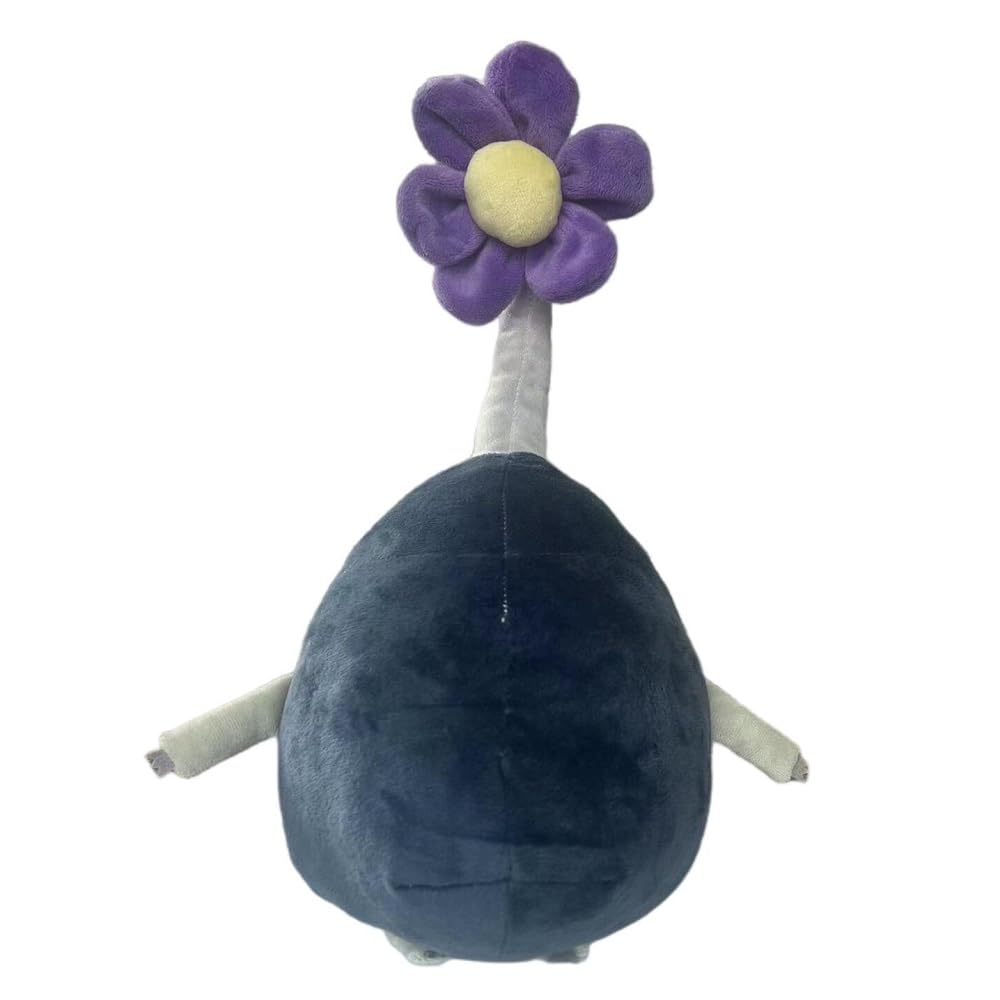 Vadkind Pikmin plush resting in hands during bedtime reading