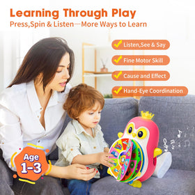 Vahome penguin arm-pull action showing spinning lights and word discovery