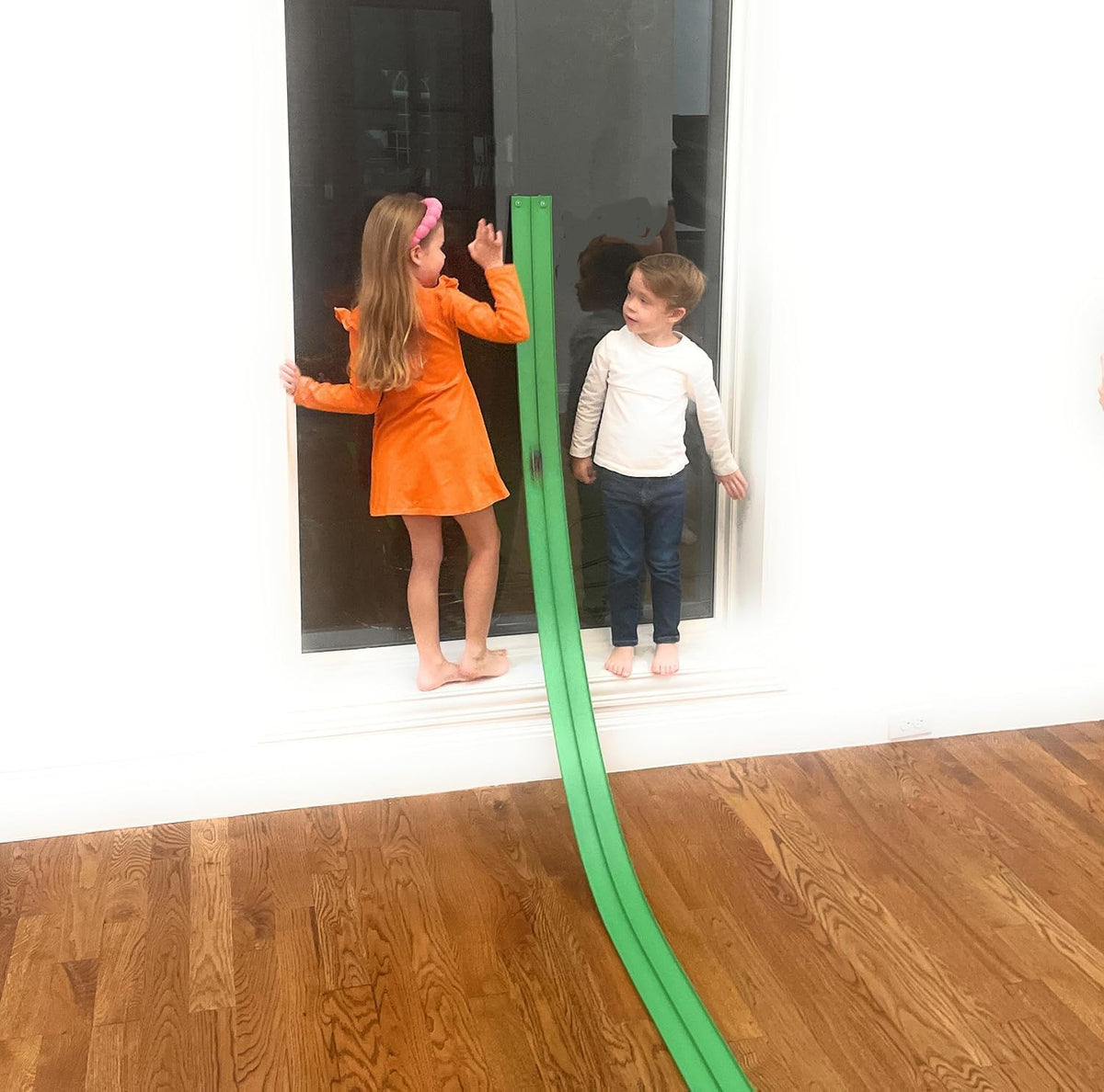 Valchemist FlexTrack suction cups securing track to windows and surfaces for on-the-go play