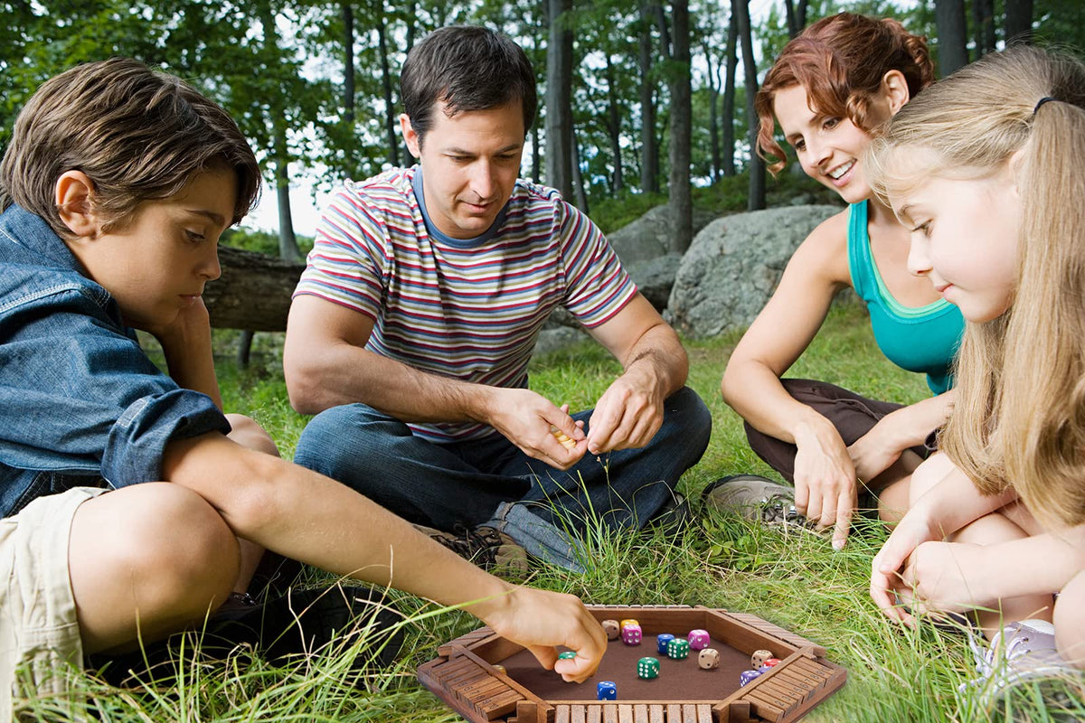 Vamslove Shut the Box players around board enjoying social game night
