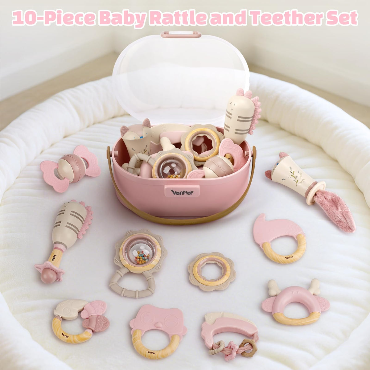 Vanplay pink teether rattle closeup, soft silicone soothes gums during teething