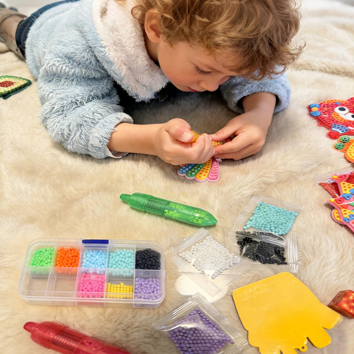 VattaFrast DIY Bead Art kit molds and templates inspire kids to create unique patterns.
