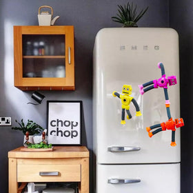 Kids playing with Veakeqe robot toy, showcasing imaginative sensory fun.
