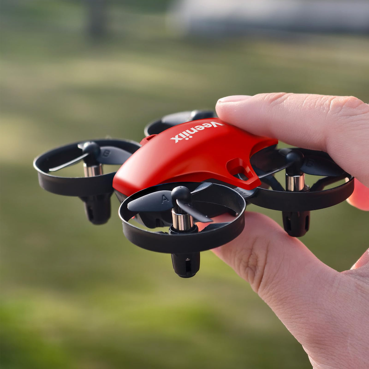 Veeniix V995 Red Mini Drone with Toss Launch for easy indoor setup and play