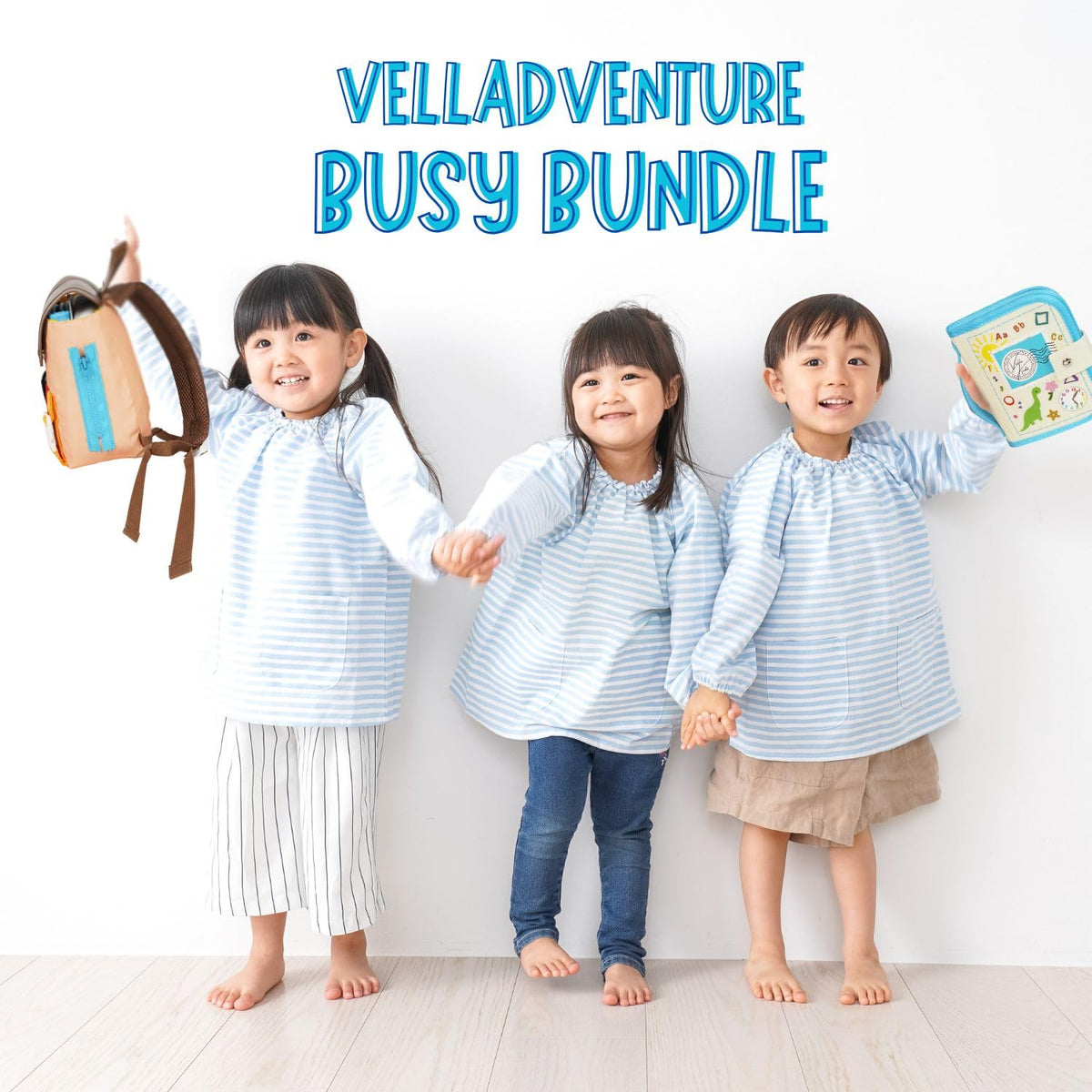 Velladventure Busy Book featuring buckles and activities for fine motor practice.