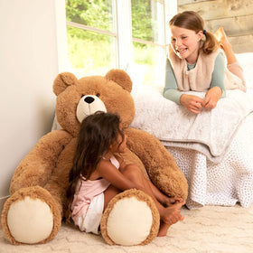 Vermont Teddy Bear giant 4 ft Easter decor scene for festive display.