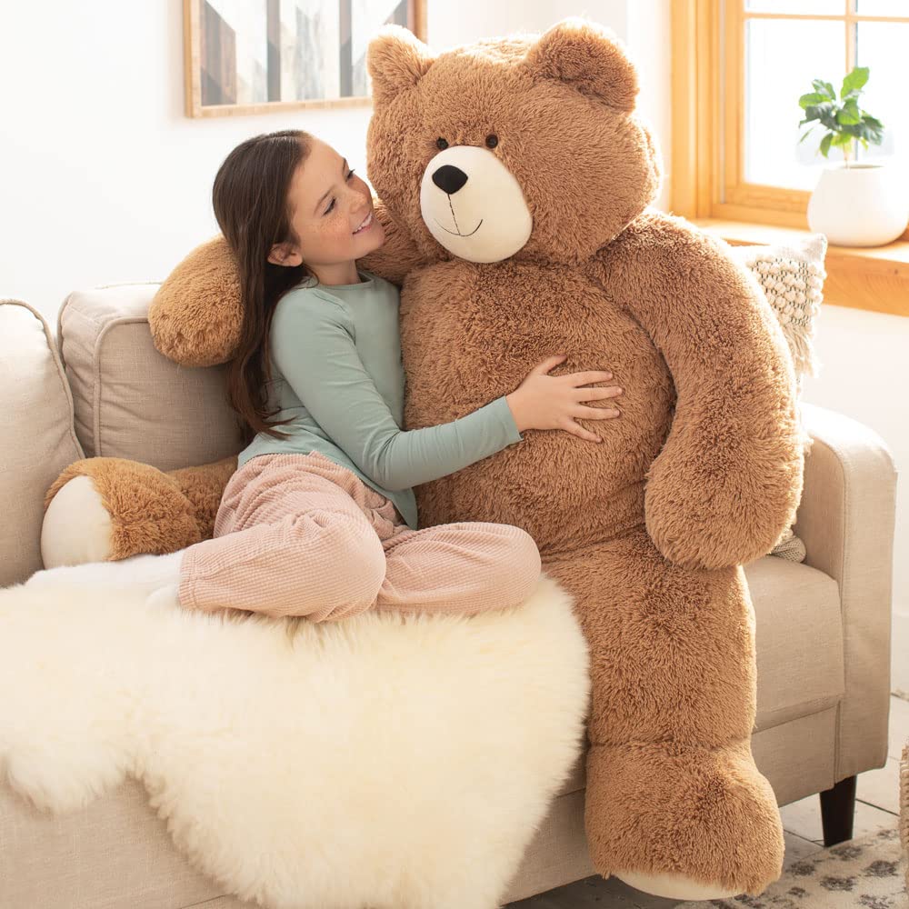 Vermont Teddy Bear giant 4 ft hugging pose shows a comforting cuddle partner.