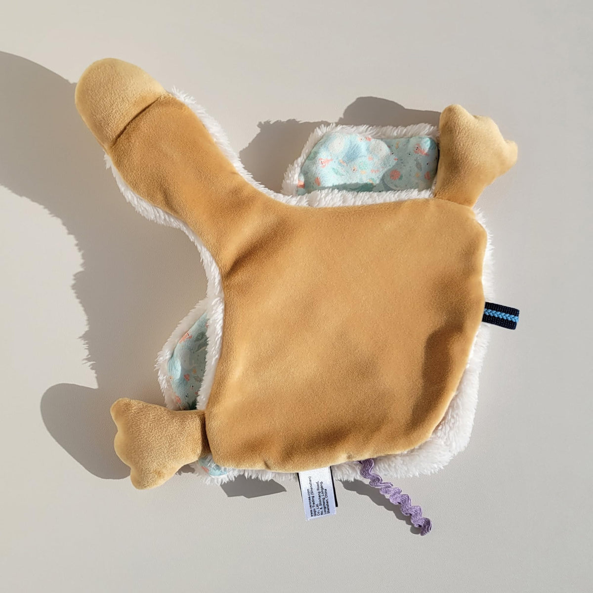 Veronea Helga Goose soft materials deliver gentle snuggles for little hands.