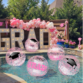 Vertintong pink grad ball close-up with cap design for festive decor.