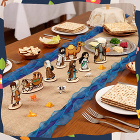 Vicenpal Passover set pyramids add architectural charm to the table vignette.