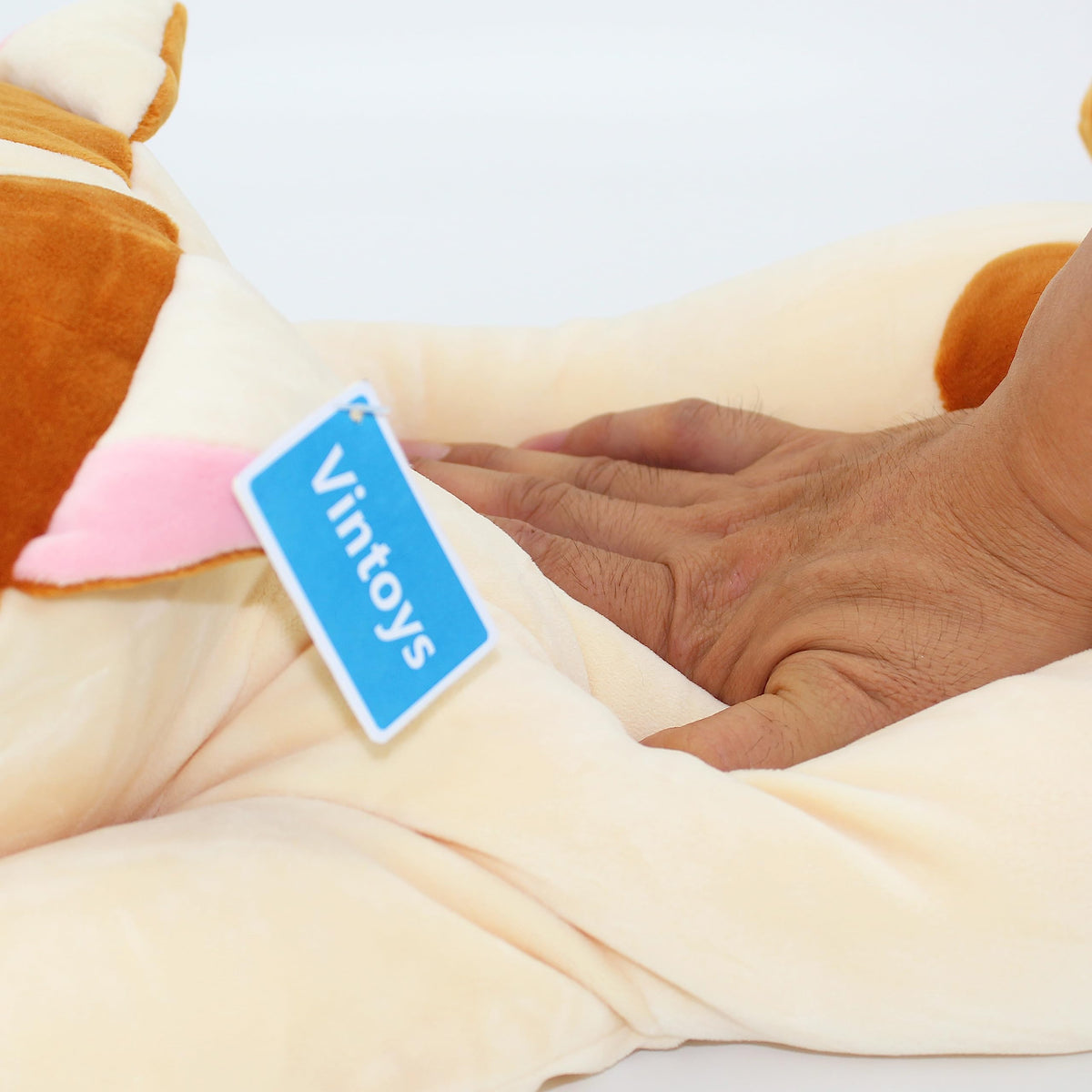 Vintoys office nap cat plush offers comfort during desk breaks.