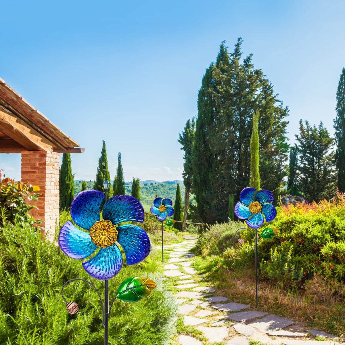 Viveta wind spinner in yard with rotation, lively outdoor accent