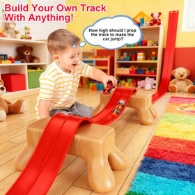 Vlkslasy kids build a DIY track on a table for hands-on fun.