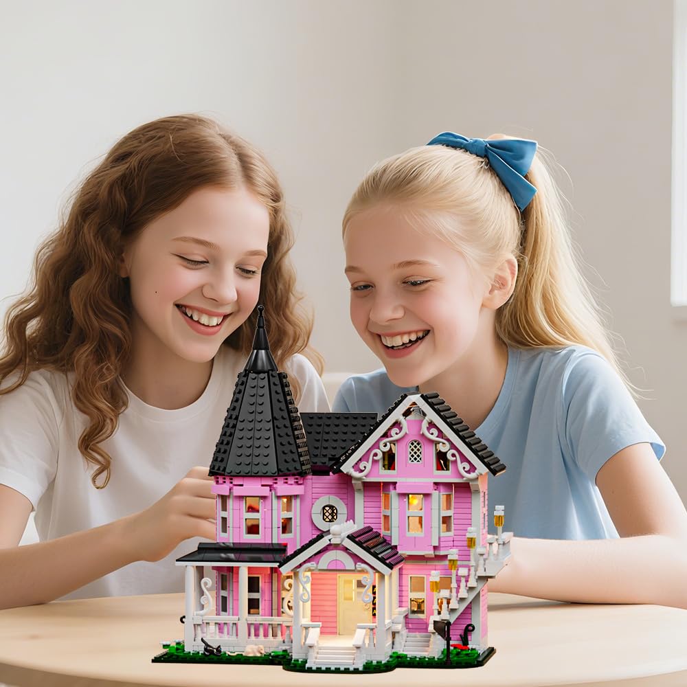 Voxifyx Pink Palace three-story exterior showcases a cute fairy-tale vibe.