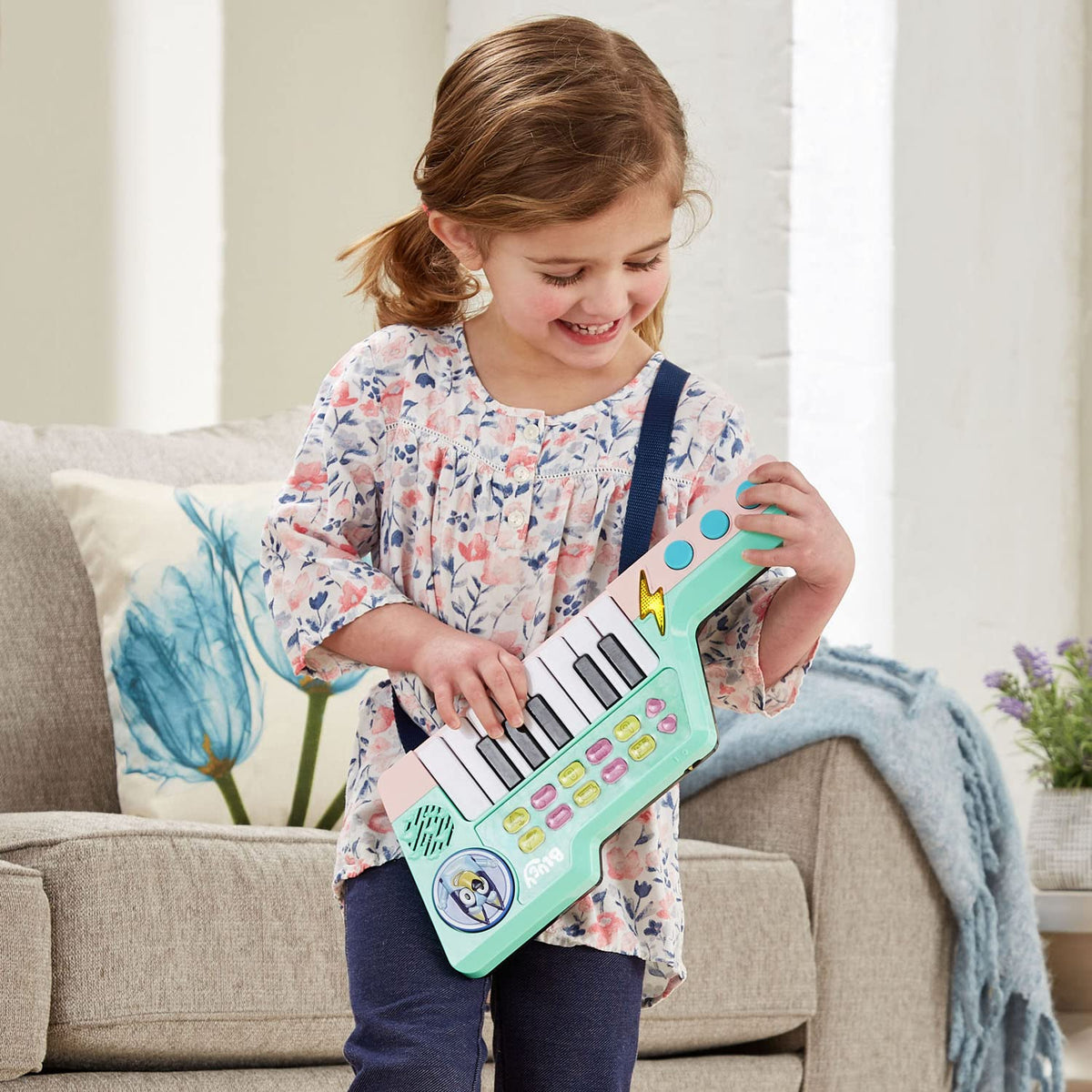 Included strap lets kids take the Keytar on the go.