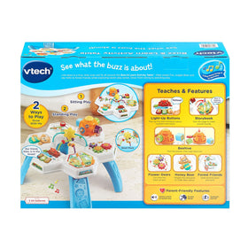 VTech Buzz and Learn table with friends playing together
