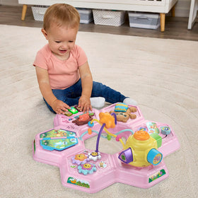 VTech Buzz and Learn table flower gears promote fine motor skills