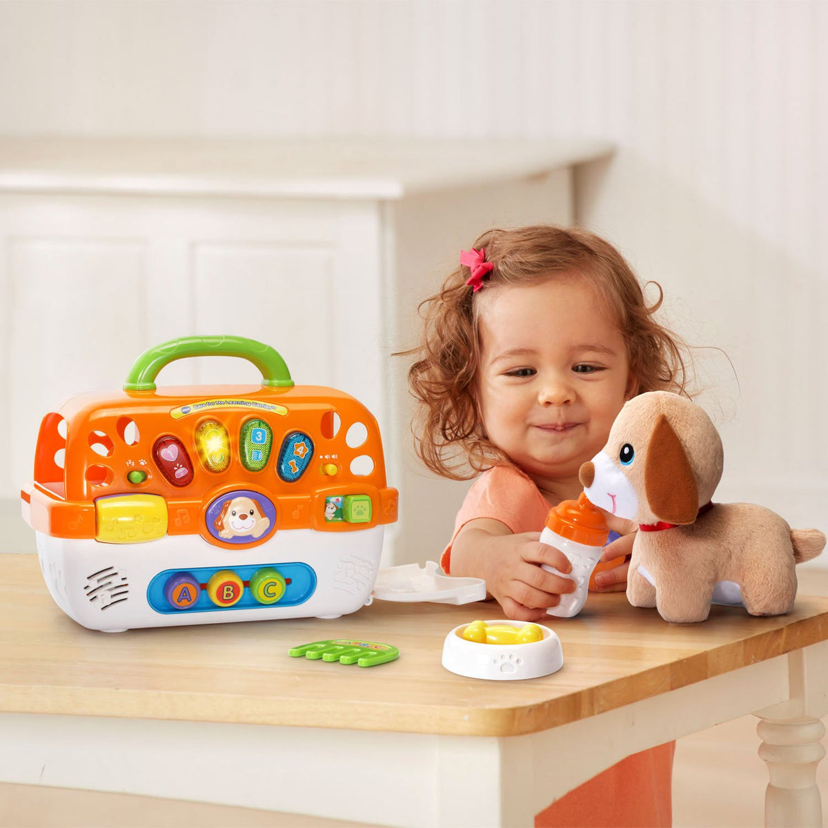 VTech Care for Me Carrier portable handle for on-the-go play.