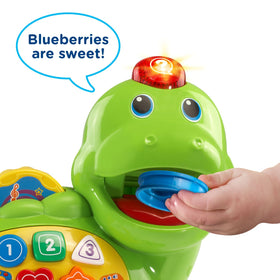 VTech Chomp and Count Dino shows color pieces for early color learning.