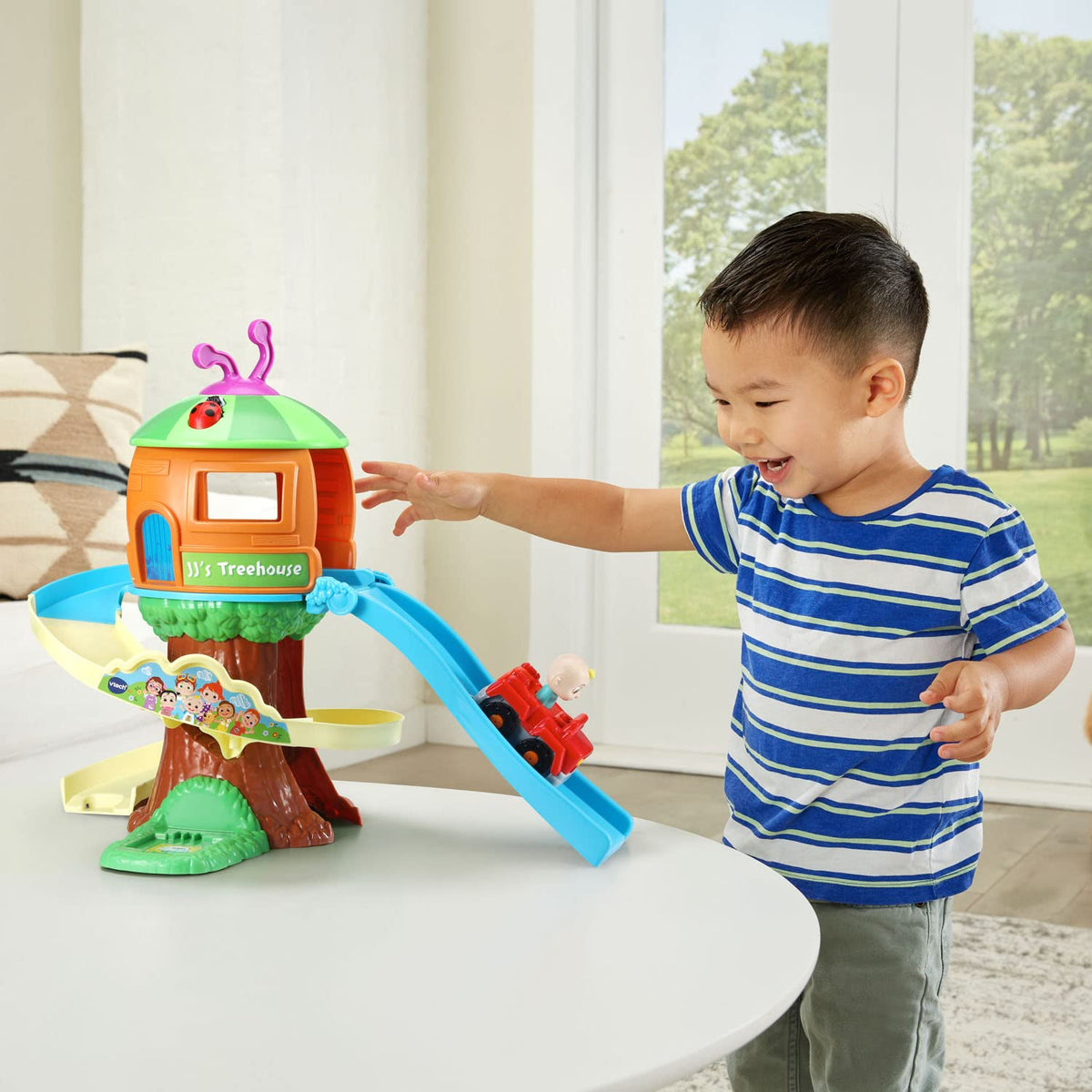 VTech CoComelon SmartPoint panels trigger phrases and songs for direction learning.