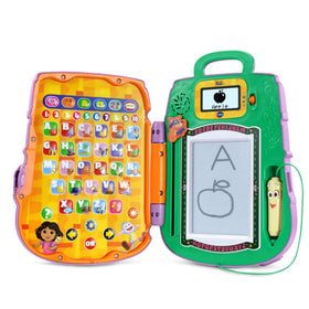 VTech Dora bilingual screen presents English and Spanish prompts for practice.
