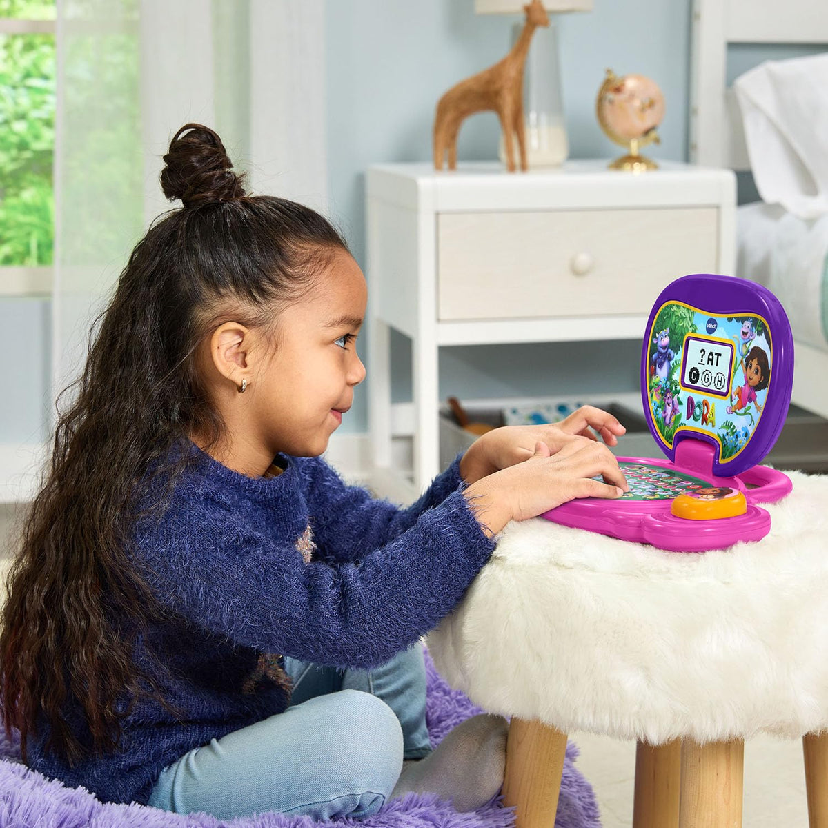 VTech Dora screen reveals map-based challenges and treasure hunts for problem-solving