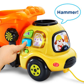 VTech Drop and Go Dump Truck orange buttons; melodies, phrases, and colors teach moments