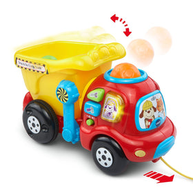 VTech Drop and Go Dump Truck yellow rocks in bucket demonstrate cause and effect play