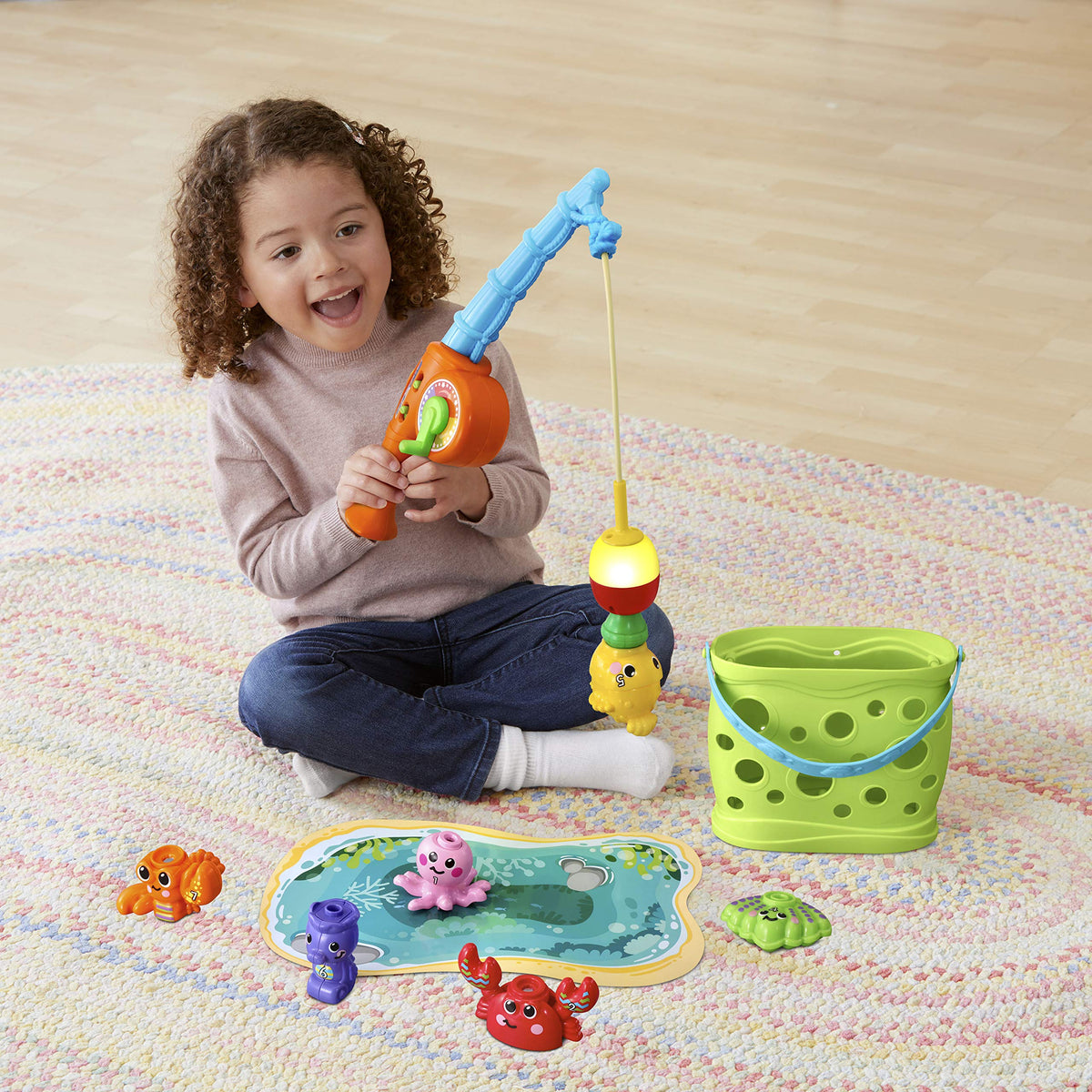 Songs and melodies accompany the Jiggle and Giggle fishing play