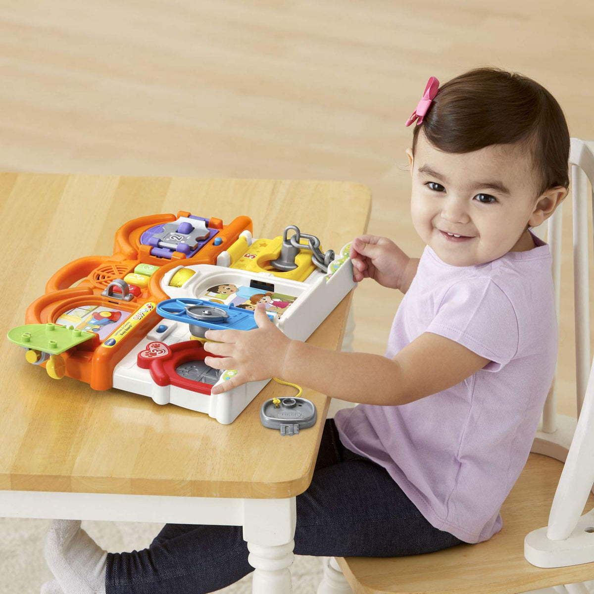 VTech Latches and Doors Busy Board handle closeup shows portable play