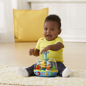 VTech Learn and Spin Aquarium: three buttons introduce animals, colors, and numbers.