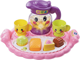 VTech Learn and Discover Pretty Party Playset pitcher lights up to teach color recognition.
