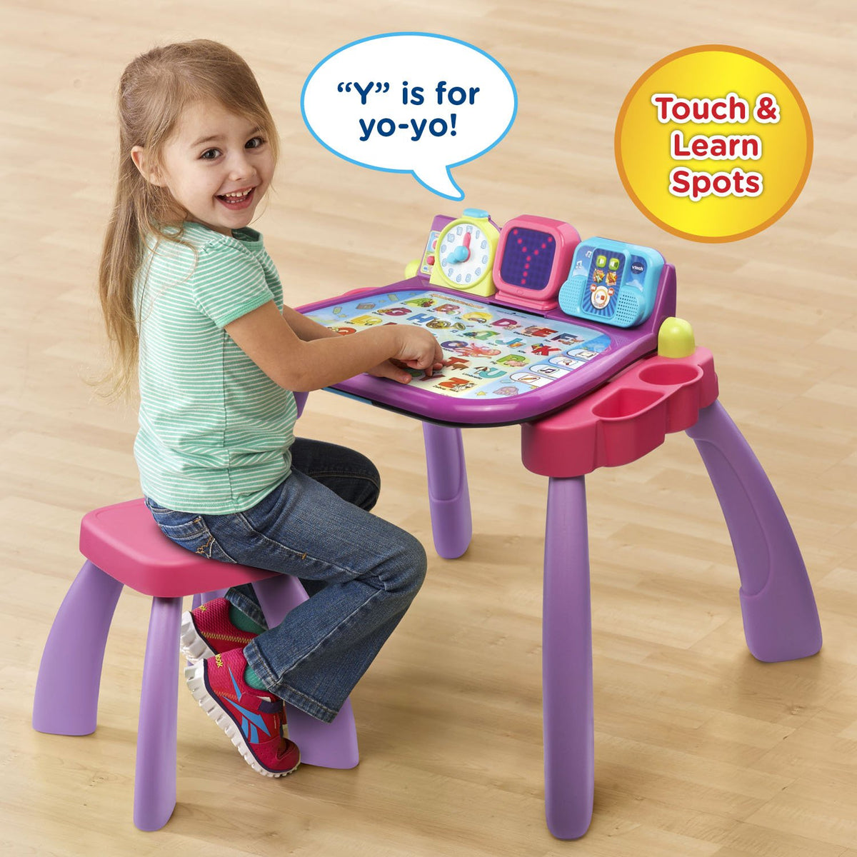 LED screen demonstrates letter and number writing for guided practice with VTech desk.