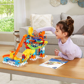 VTech Marble Rush Raceway launcher keeps marbles moving during play.