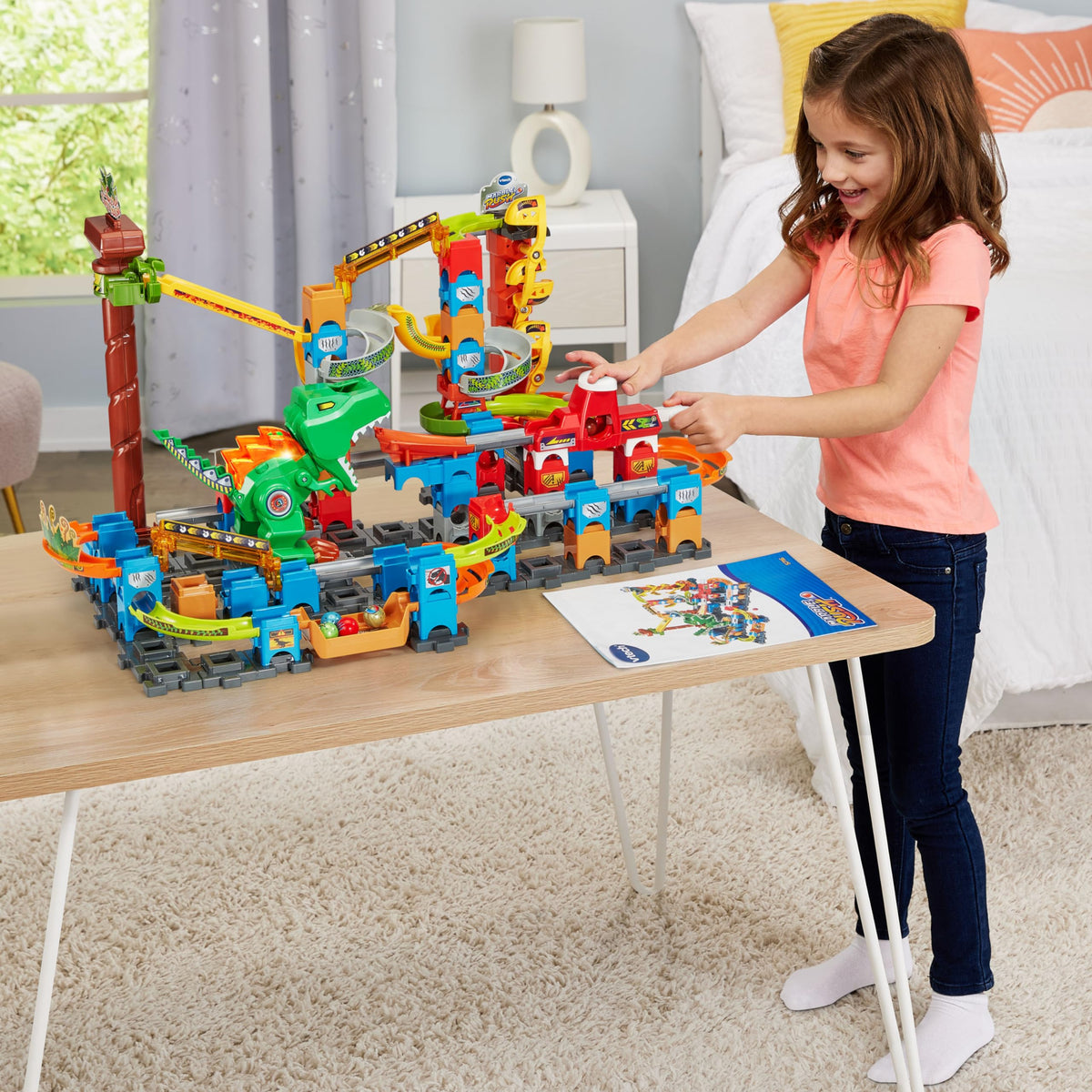 VTech Marble Rush three-build guide sparks creative dinosaur-themed course ideas.