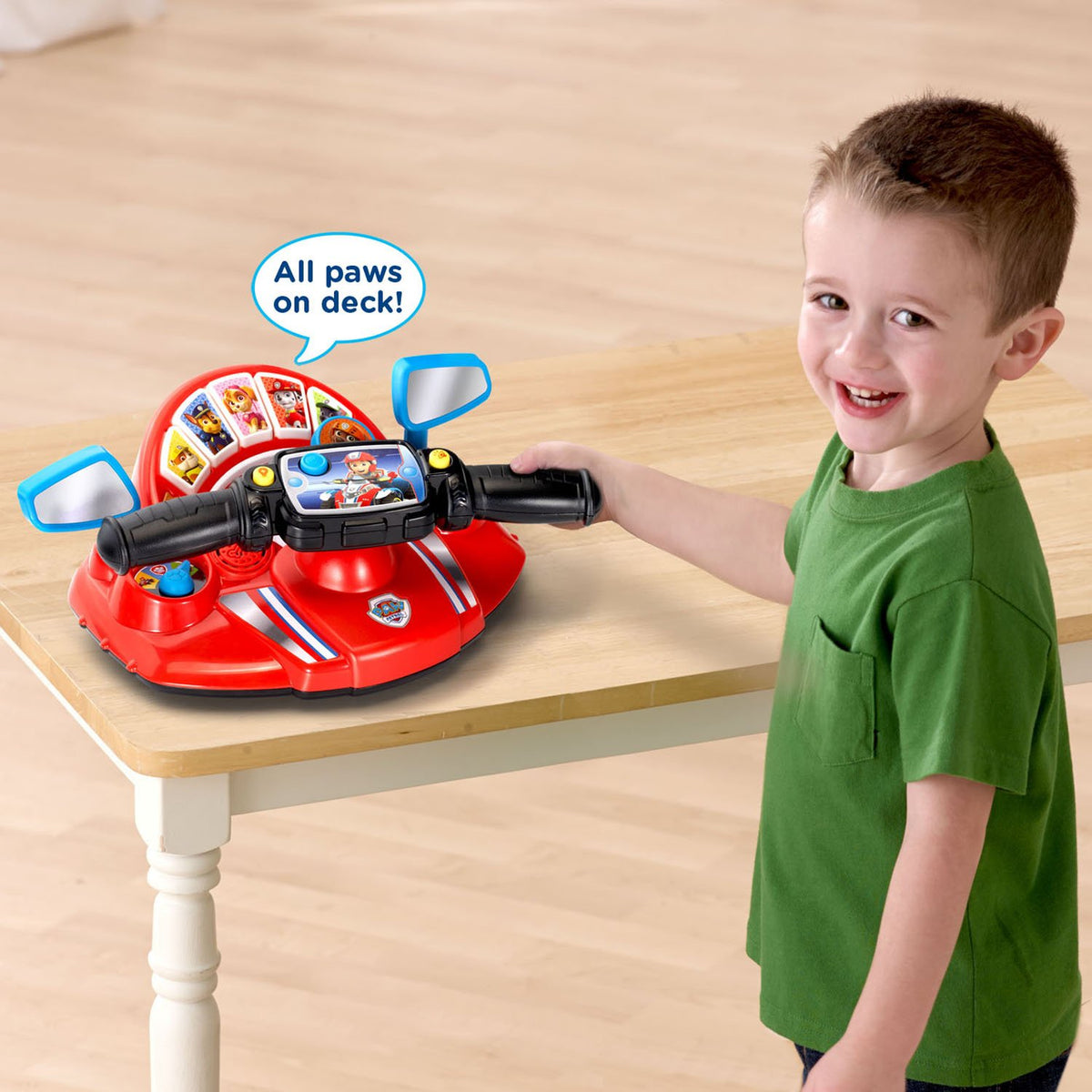 VTech Paw Patrol Pups to The Rescue Driver red Ryder button summons pups to action.