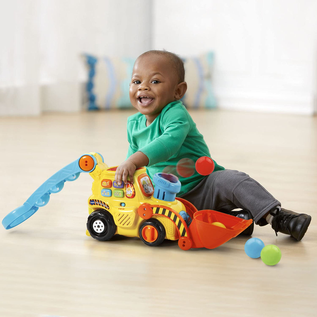 VTech Pop-a-Balls Bulldozer on-move tunes accompany push-and-play for musical fun.