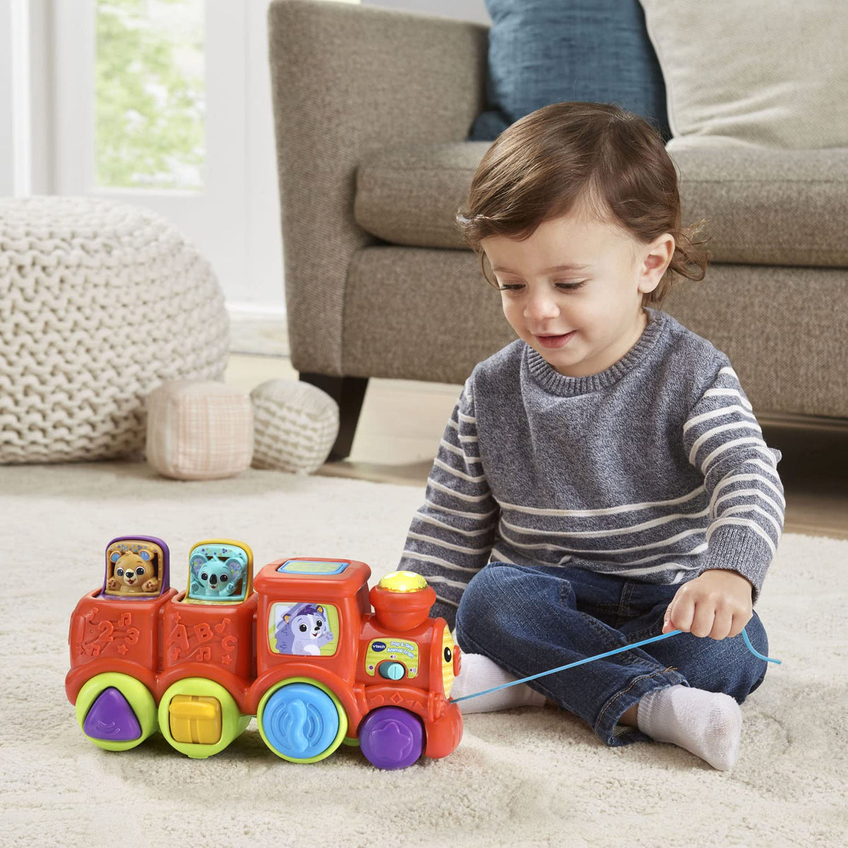 VTech Pop and Sing Animal Train crawl-to-play encourages little walkers